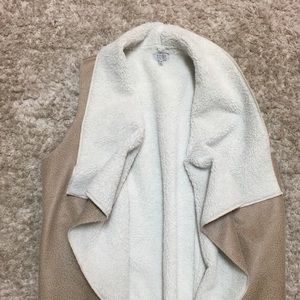 Tobi light brown, fuzzy on the inside vest